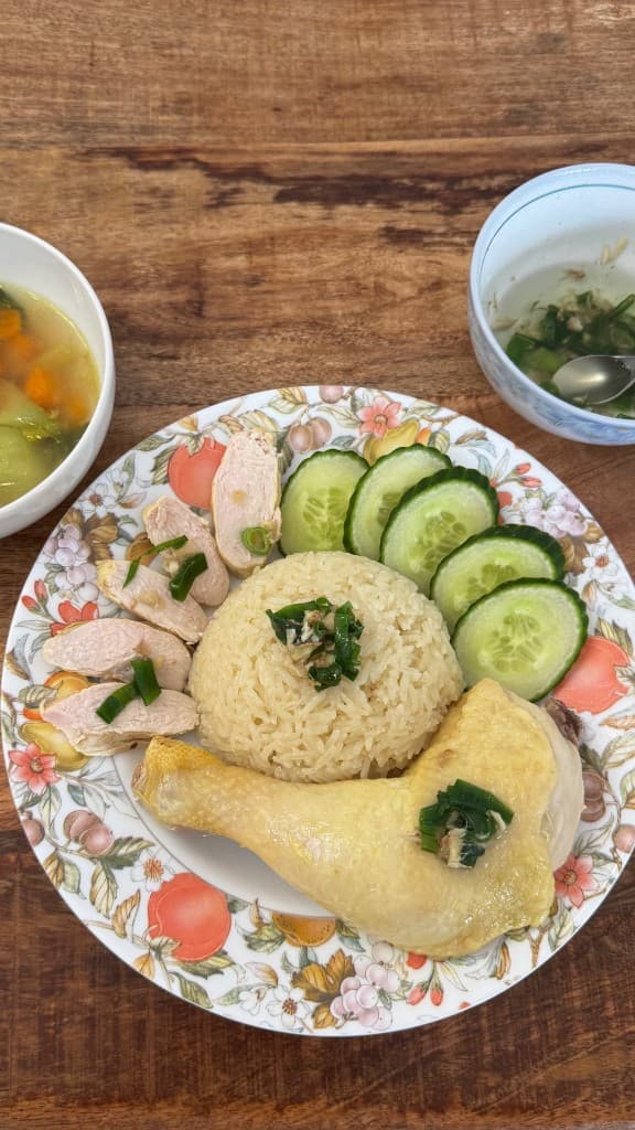 Homemade Hainanese chicken rice plated at home